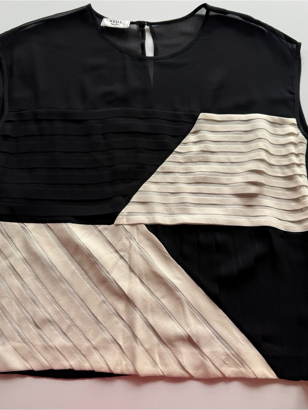 Black and Cream Sleeveless Pleated Panel blouse